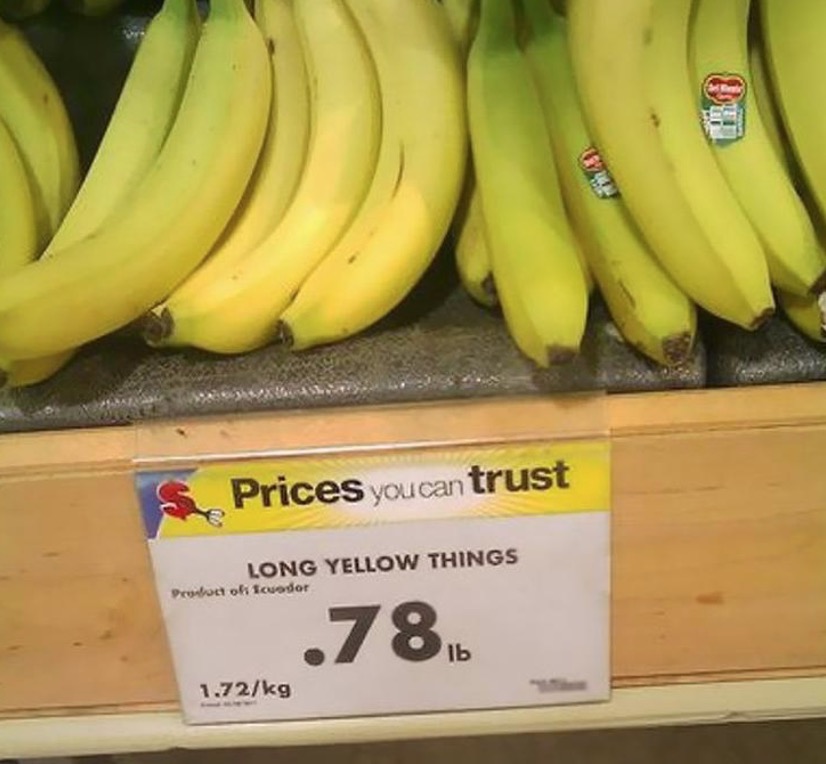Bananen mit Verkaufsschild 